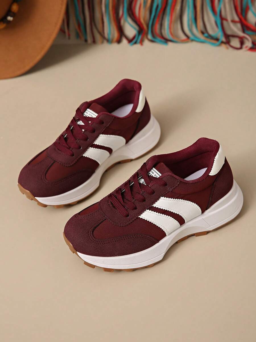 Retro gestreepte sneakers voor dames met dikke zool