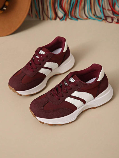 Retro gestreepte sneakers voor dames met dikke zool