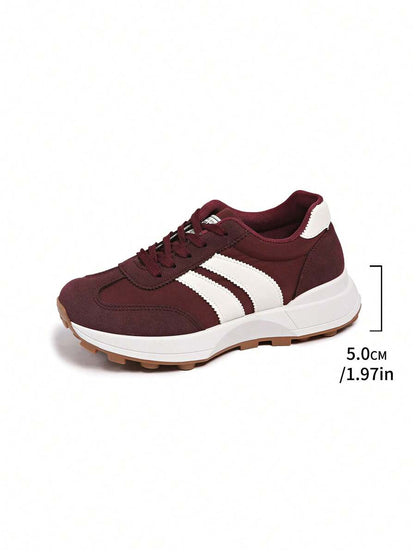 Retro gestreepte sneakers voor dames met dikke zool