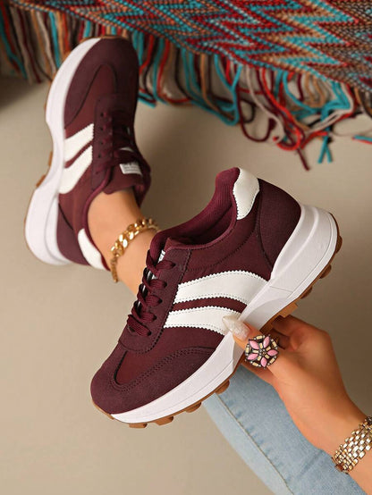 Retro gestreepte sneakers voor dames met dikke zool